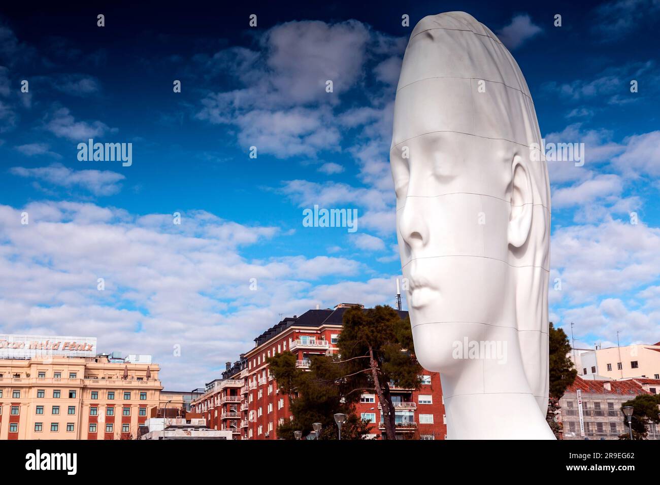 Madrid, Spain - FEB 19, 2022: Modern sculpture titled Julia by Jaume Plensa Sune located at the Plaza de Colon in Madrid, Spain. Stock Photo
