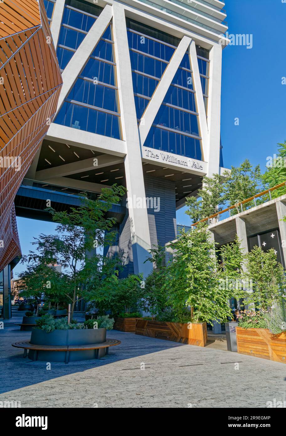 The William Vale hotel rises over truss-enclosed office floors, which ...