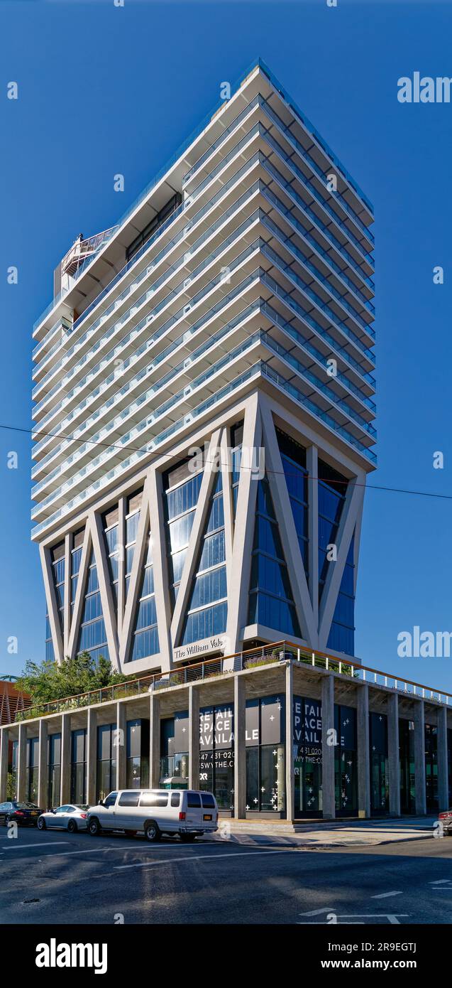 The William Vale hotel rises over truss-enclosed office floors, which ...