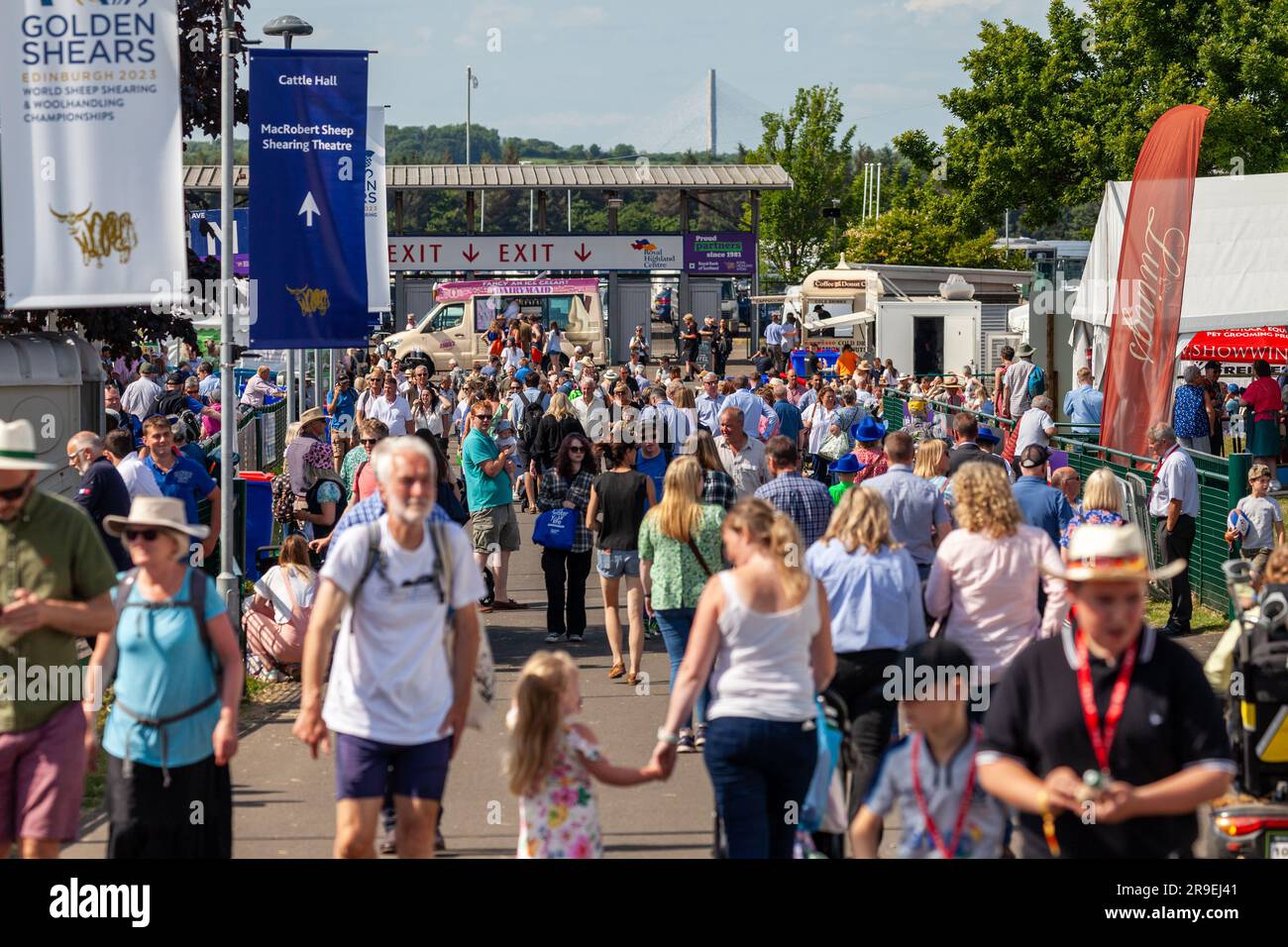 People walking along a road in the Highland Show Edinburgh Stock Photo