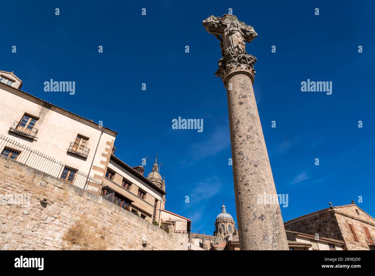 Jesus Christ on cross stone monument in Salamanca, Castile and Leon, Spain. Stock Photo