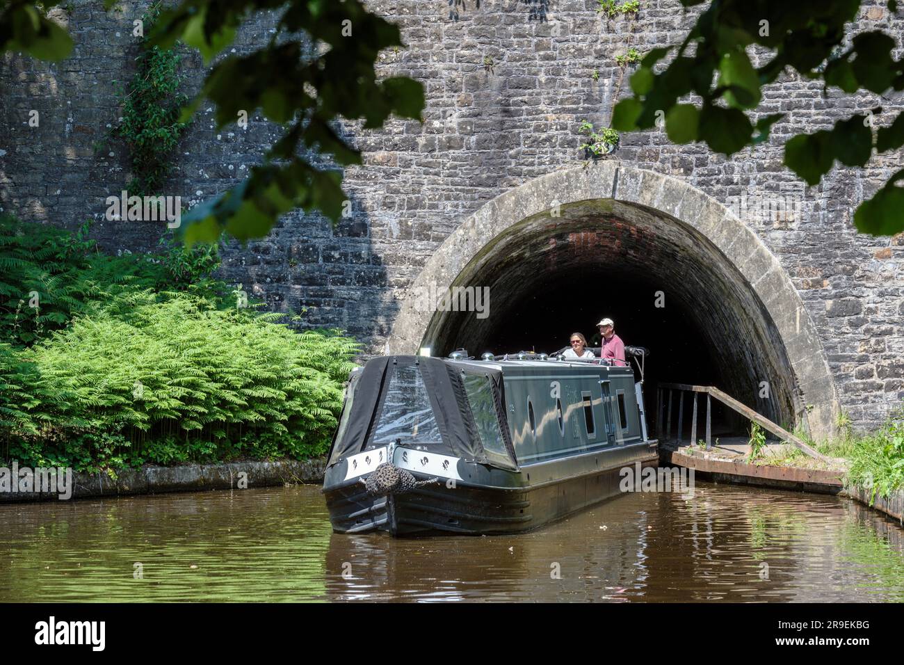 A narrowboat coming out of the Chirk Tunnel, Shropshire Union Canal Llangollen Branch, Wales Stock Photo