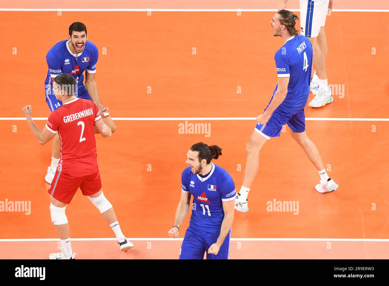 France volleyball team celebrating a point against Italy . Volleyball