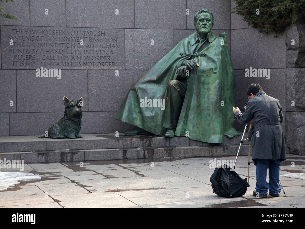 A tourists photographing part of the Franklin Delano Roosevelt Memorial. Washington, DC. USA. Stock Photo