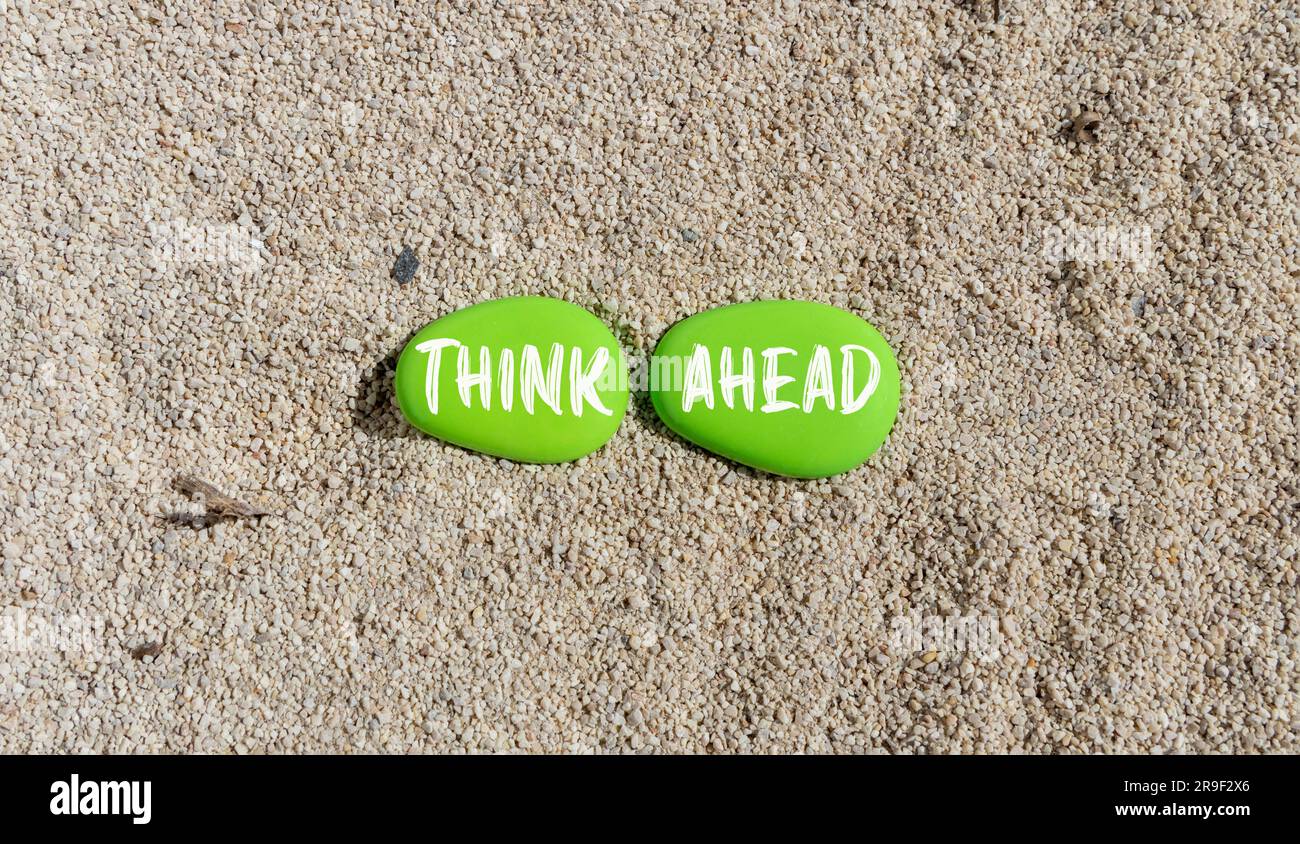 Think ahead symbol. Concept words Think ahead on beautiful green stone