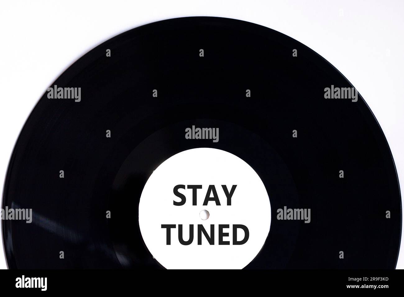 Stay tuned symbol. Concept words Stay tuned on beautiful black vinyl ...