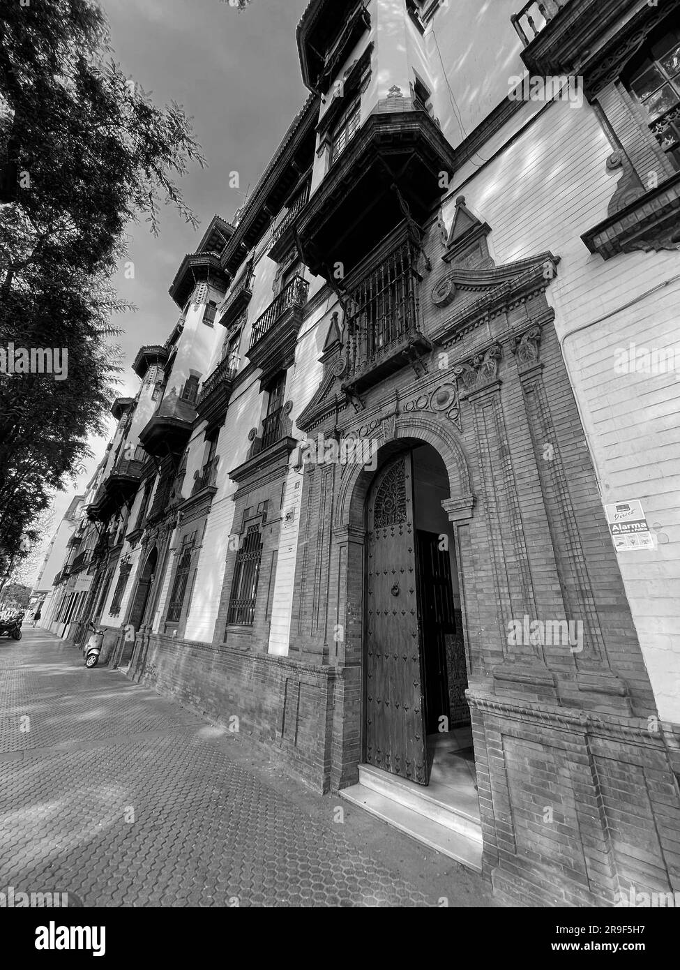 Seville, Spain-FEB 24, 2022: Typical street view and generic architecture in Seville, Andalusia, Spain. Stock Photo