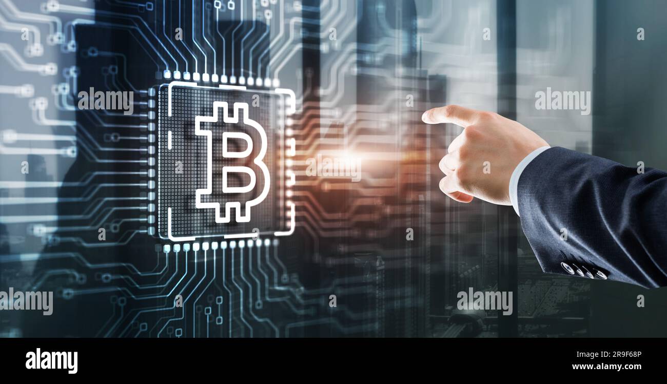 Businessman clicking on virtual screen Bitcoin Cryptocurrency concept. Mining factory. Server racks background. Stock Photo