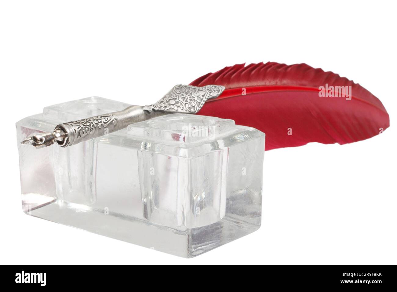 Old vintage red fountain pen with inkwell on white background Stock ...