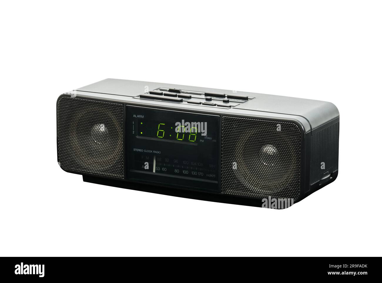 Old stereo alarm clock radio isolated with cut out background. Stock Photo