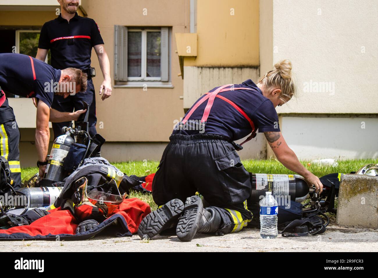 Firefighters are working to put out a fire that broke out in one of the ...