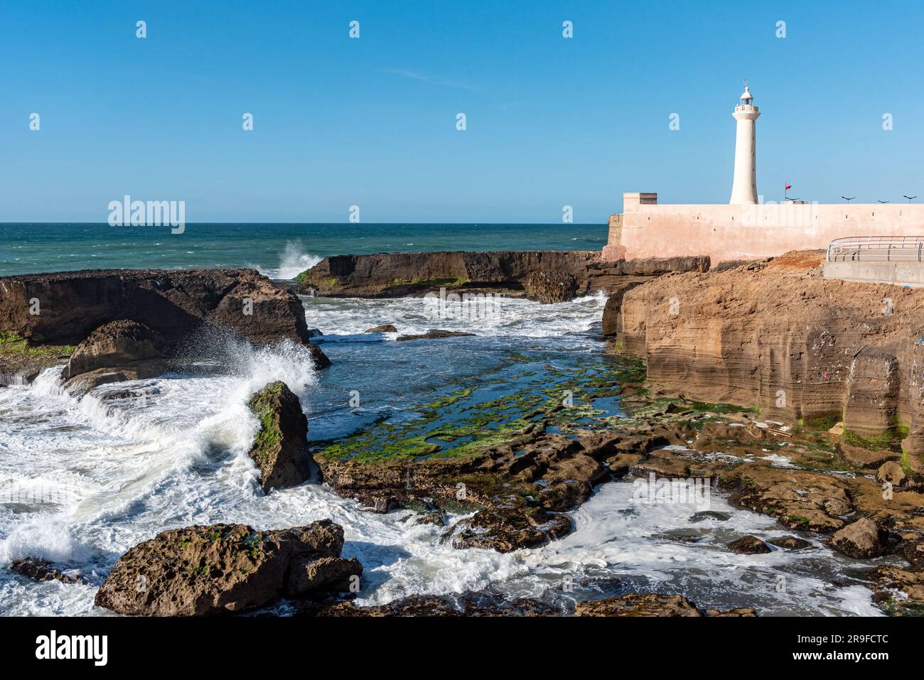 The lighthouse of Rabat during calm sea, Morocco Stock Photo - Alamy