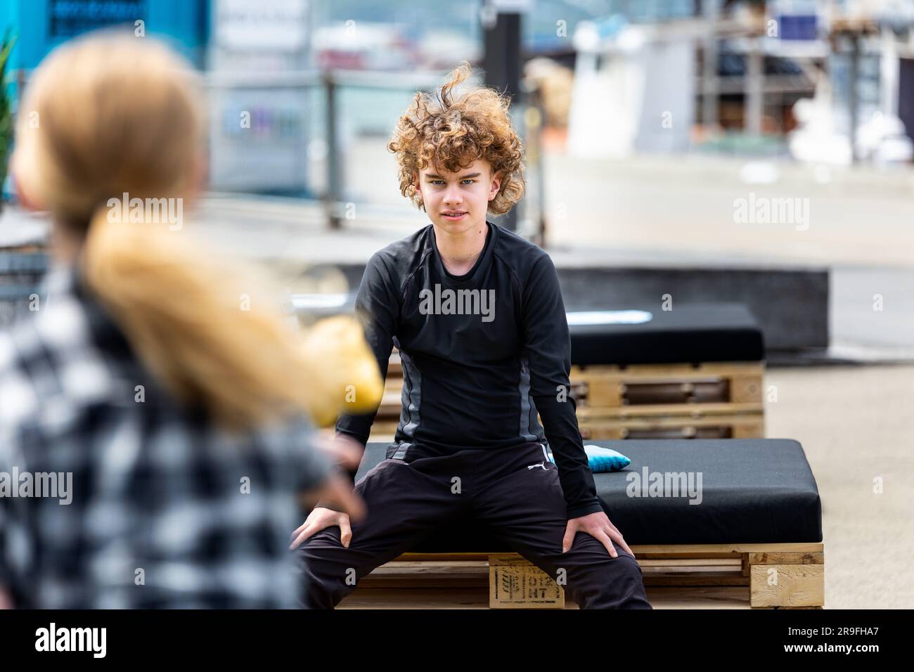 A family play a throwing game in Wellington New Zealand Capital City