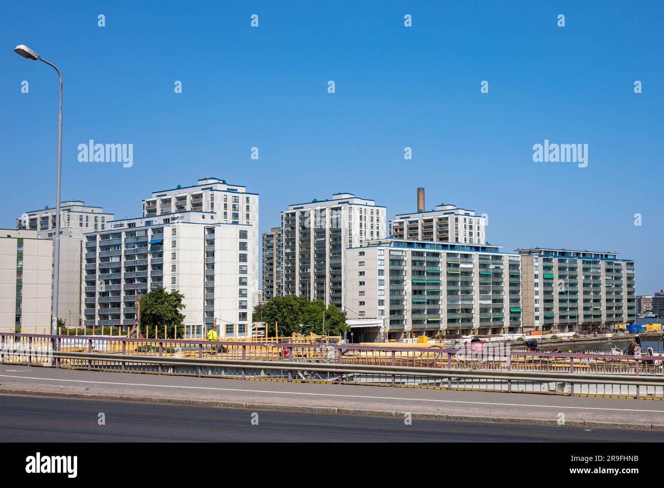 Concrete architecture of residential Merihaka district against clear blue sky on a sunny summer day in Helsinki, Finland Stock Photo
