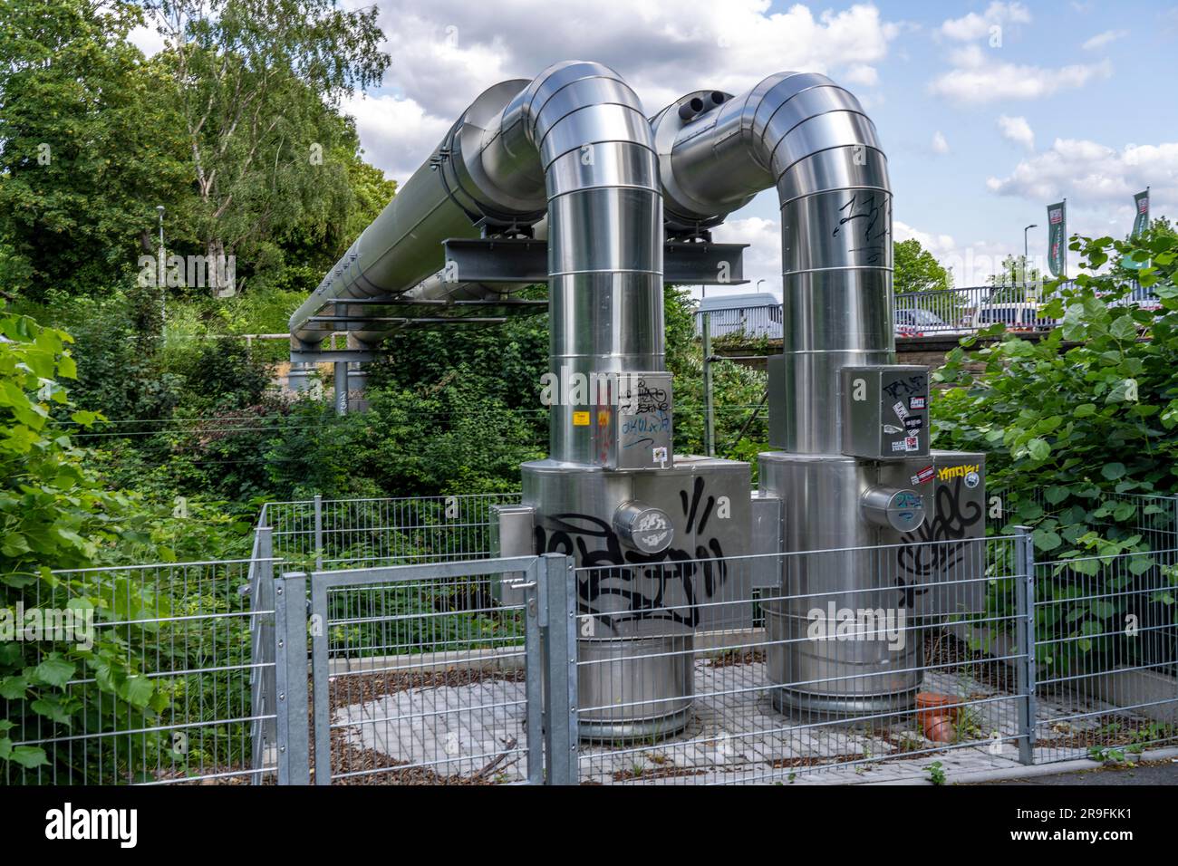 New district heating pipeline of STEAG in Essen, over the railway tracks of line S6 in Essen-Süd, part of the new 12 km long eastern route through the Stock Photo