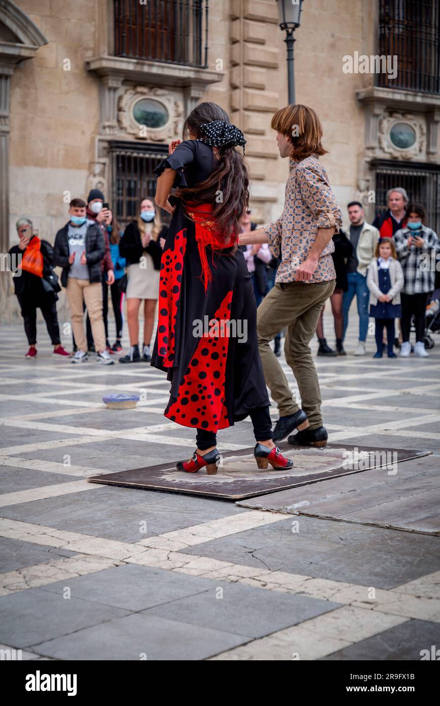 Granada, Spain-Feb 26, 2022: Group of Gypsy artists performing flamenco art in the street in Granada, Andalucia, Spain. Stock Photo