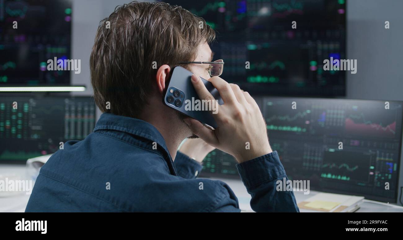 Broker Computer Screen Trader stock screens back view hi-res stock photography and images - Alamy