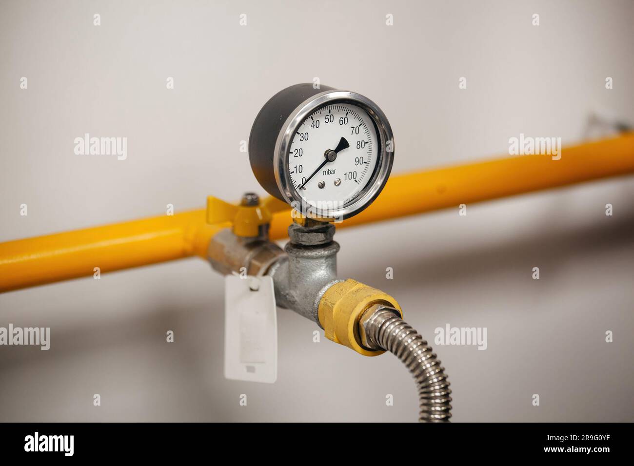 Pipe with pressure gauge, close up, selective focus Stock Photo - Alamy