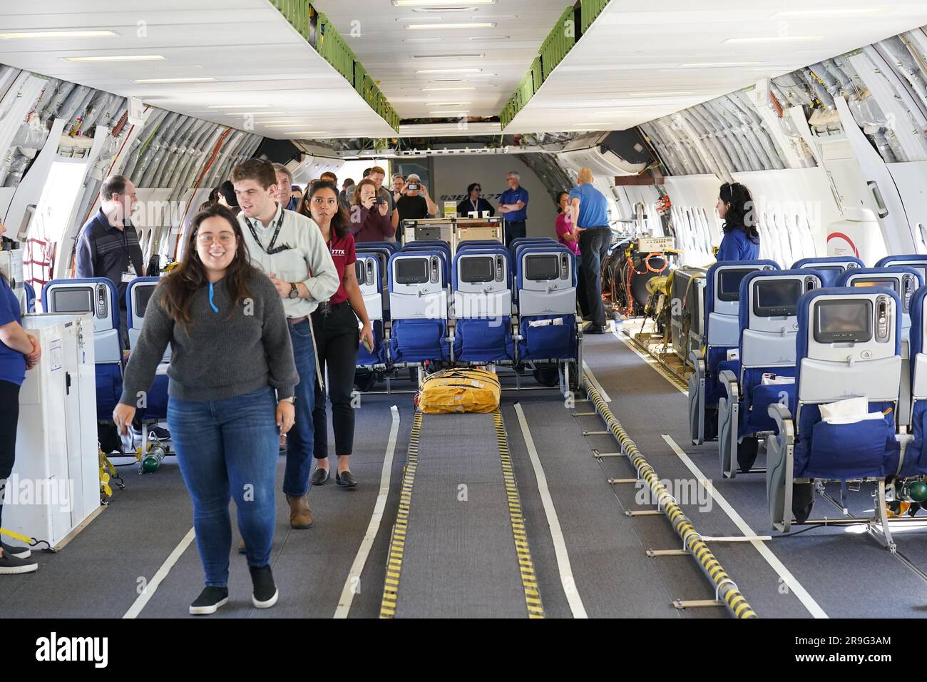 Boeing employees walk through a Boeing 777-9, commercial jet that is in St. Louis for a layover at St. Louis-Lambert International Airport in St. Louis on Monday, June 26, 2023. The 777-9 is the only Boeing commercial airplane with St. Louis- made parts on the aircraft. Boeing employees will spend the day touring the aircraft, seeing it for the first time since production began. Boeing employees in St. Louis produce the 777-9's folding wing tip, moveable trailing edge and fixed leading edge on the wings, as well as the rudder and elevator on the empennage. Photo by Bill Greenblatt/UPI Stock Photo