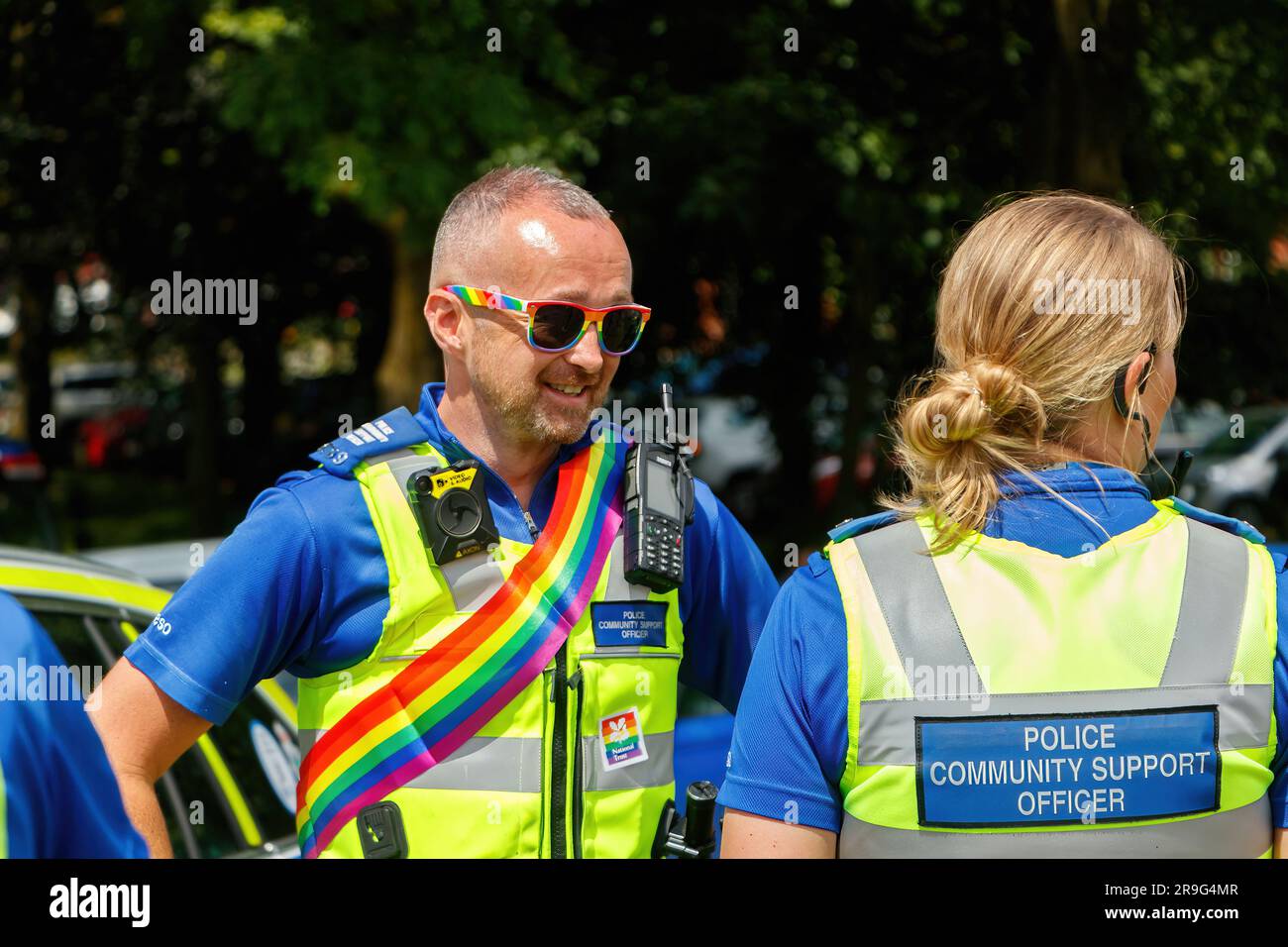 Police Commnity Support Officers PCSO Wearing Rainbow Glasses And Sash 