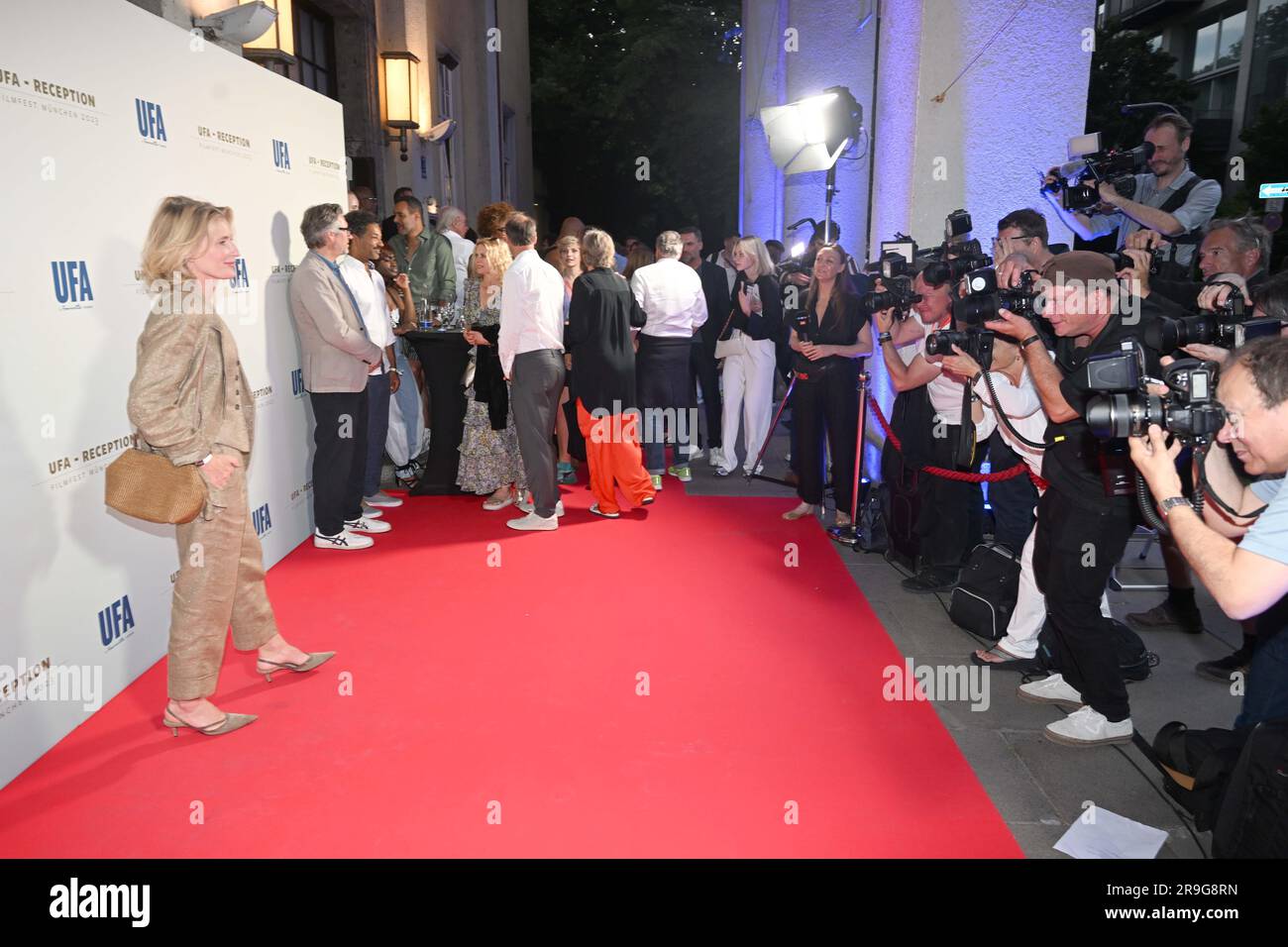 Munich, Germany. 26th June, 2023. Actress Maria Furtwängler stands on the red carpet at the UFA
