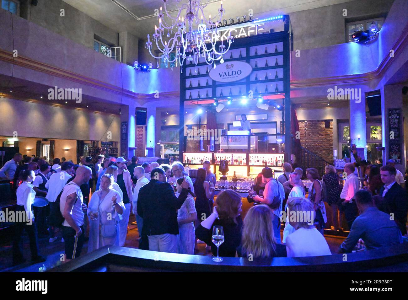 Munich, Germany. 26th June, 2023. Guests celebrate at the UFA reception at Munich's Park Café