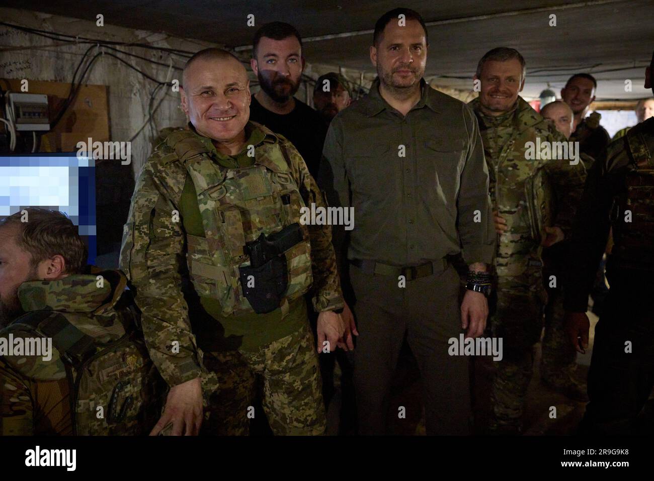 A day after an attemped military coup in Russia and during a working trip to Zaporizhzhia region, President Volodymyr Zelensky visited the frontline positions of the Armed Forces of Ukraine in the Melitopol sector.  At the command post, the Head of State listened to the report of Commander of the Tavria operational and strategic group of troops Brigadier General Oleksandr Tarnavskyi. The President was informed about the overall operational situation in the frontline area, the dynamics of advancement in the main directions and the need for certain types of weapons. Stock Photo