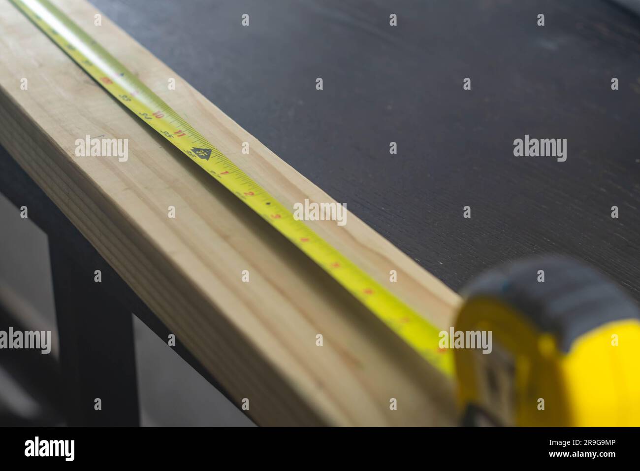 Selective focus measuring tape copy space backgrounds wood material Stock Photo