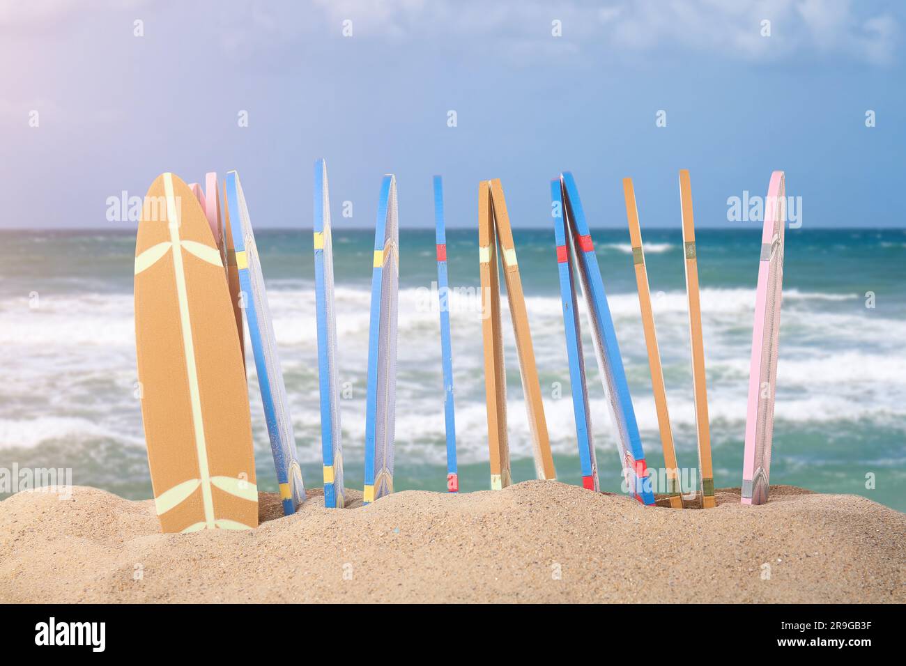 Different surfboards on beach sand Stock Photo Alamy