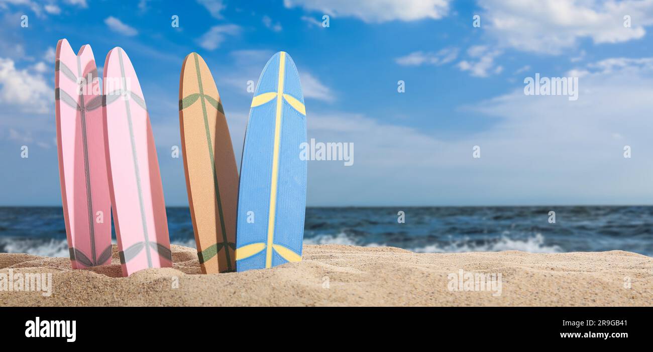 Many surfboards on beach sand Stock Photo Alamy
