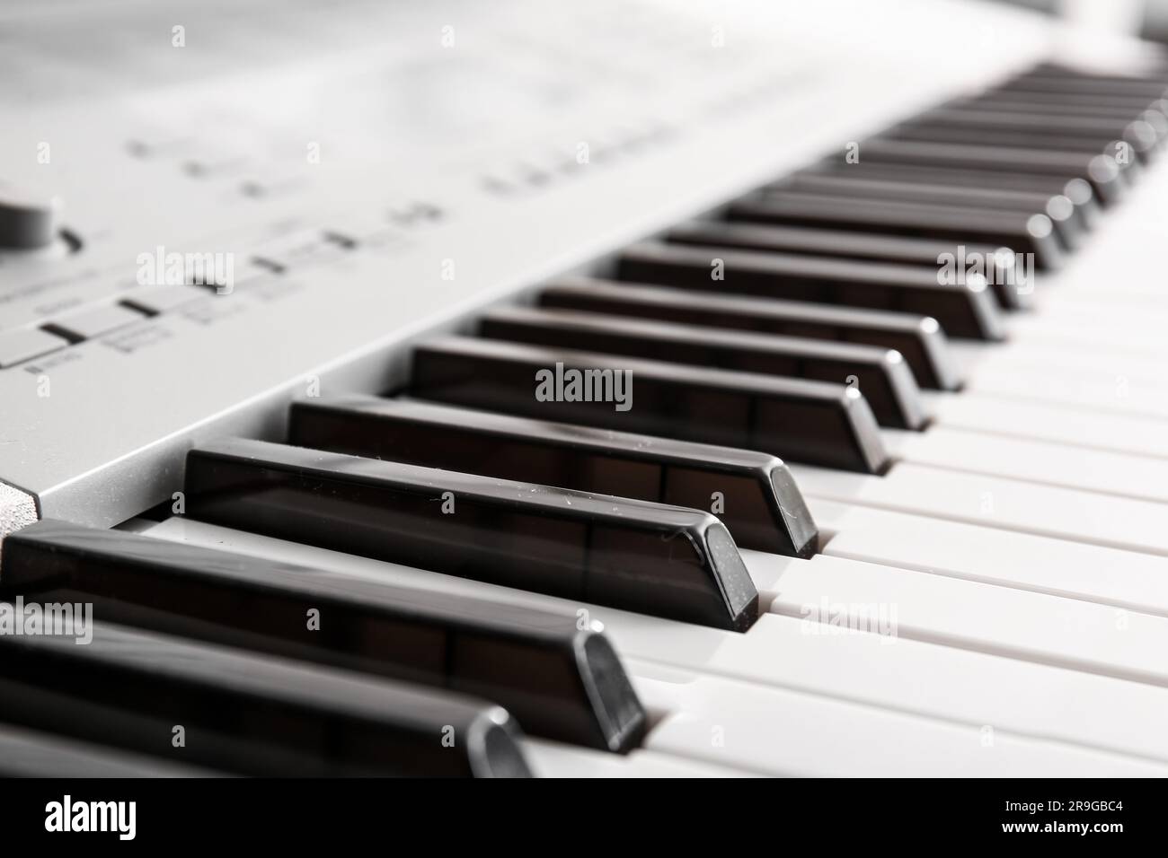 Modern synthesizer in room, closeup Stock Photo