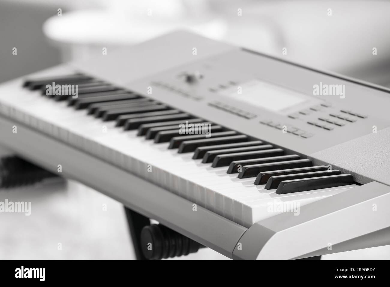 Modern synthesizer in room, closeup Stock Photo
