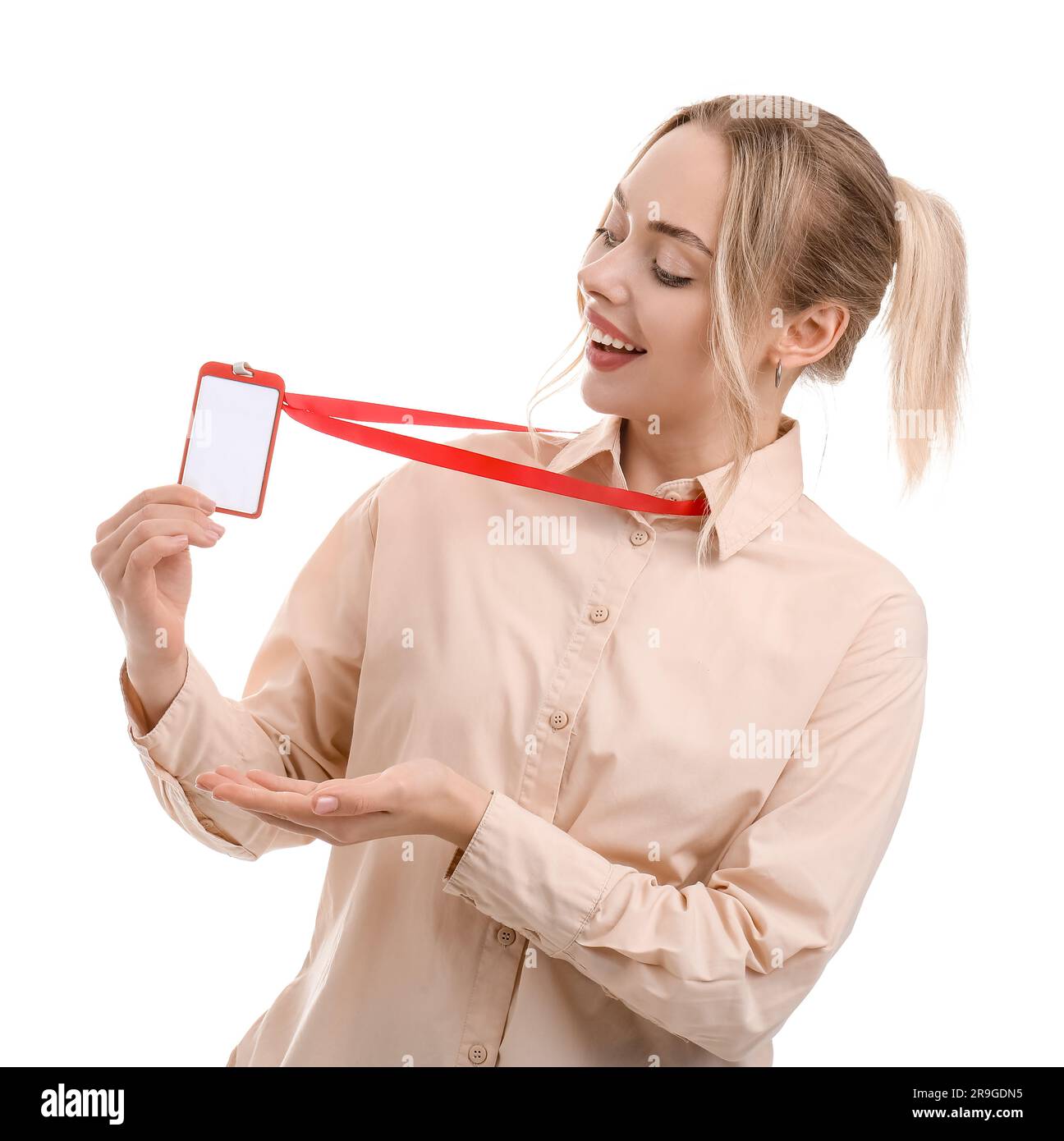 Young woman with blank badge on white background Stock Photo - Alamy