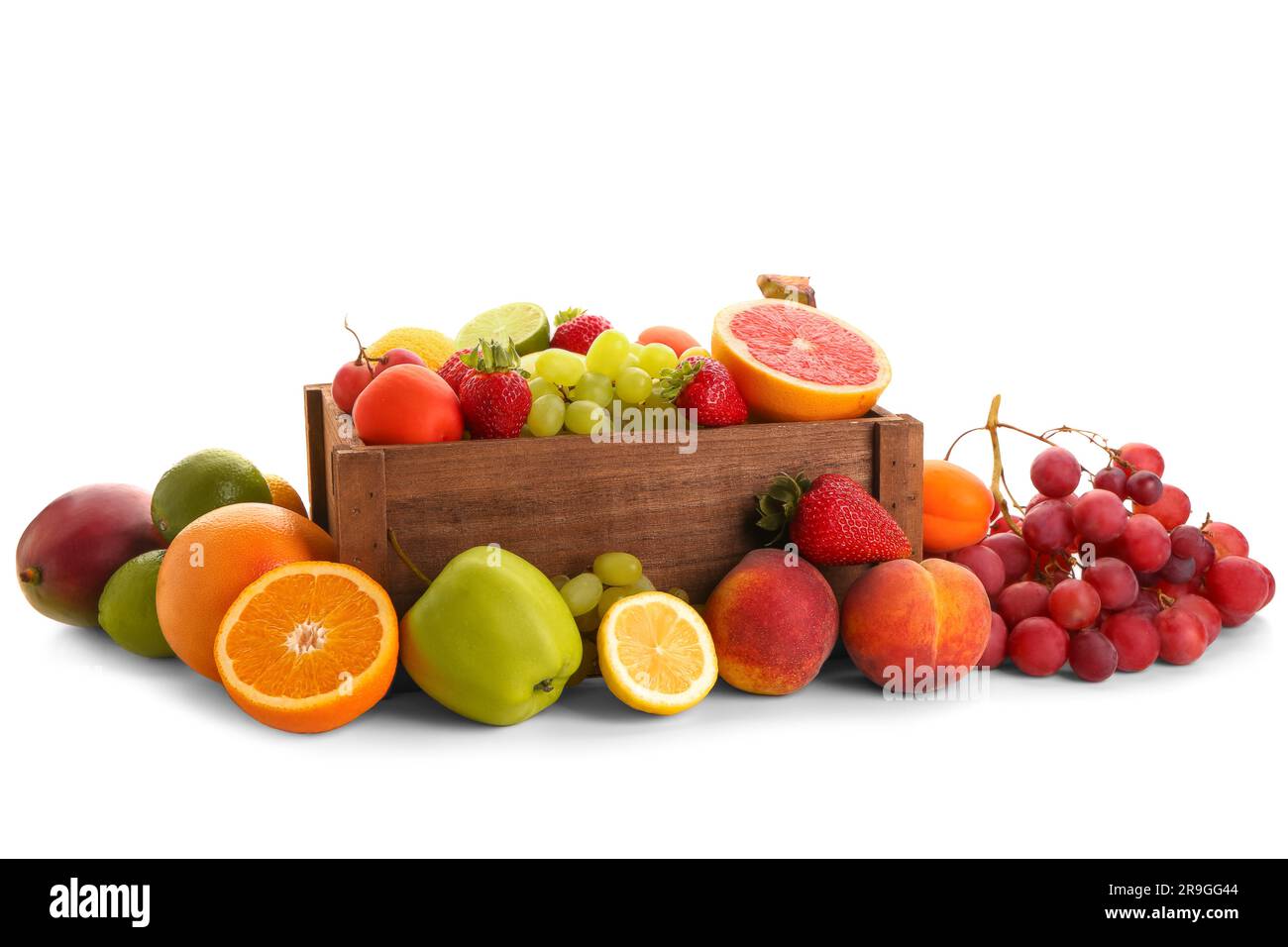 Wooden box with different fresh fruits on white background Stock Photo ...