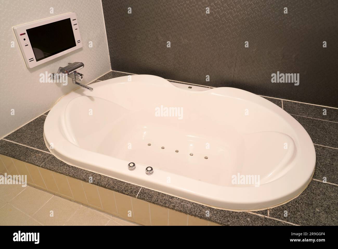 Japanese style bathroom image with brown tiles Stock Photo