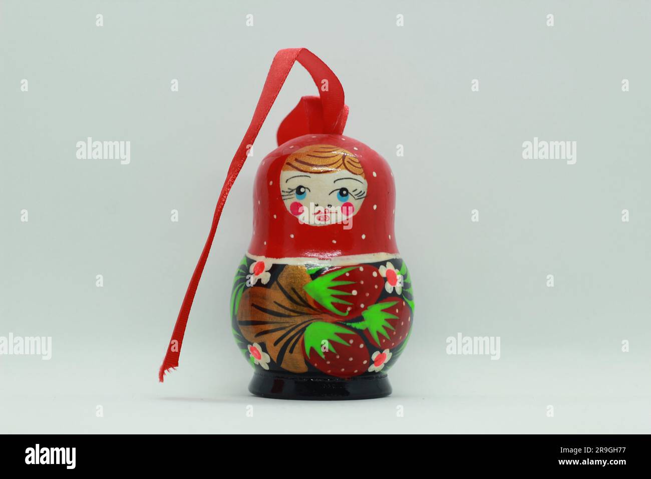 Matryoshka doll with ribbon Stock Photo