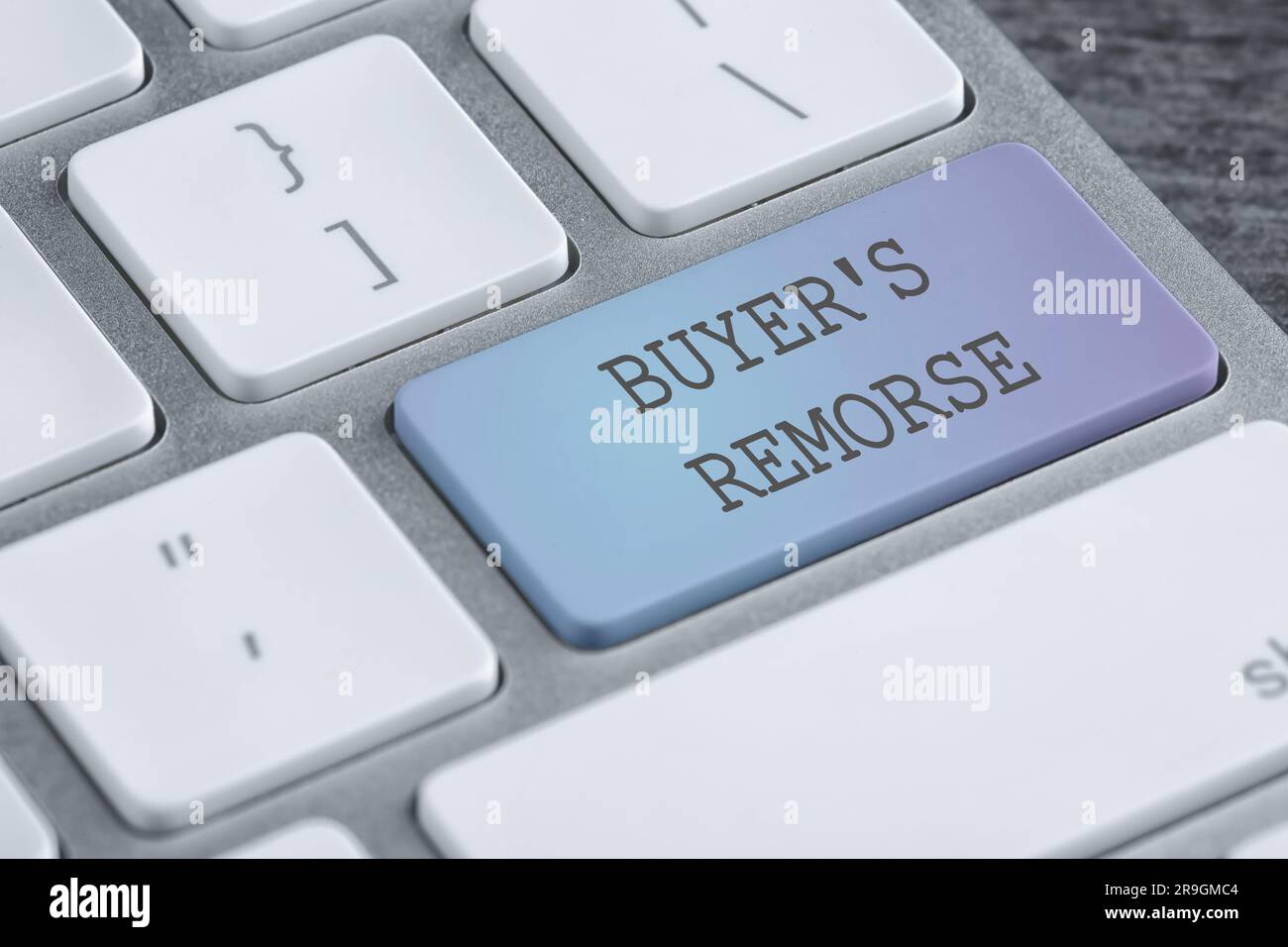 Button with text Buyer's Remorse on computer keyboard, closeup Stock Photo