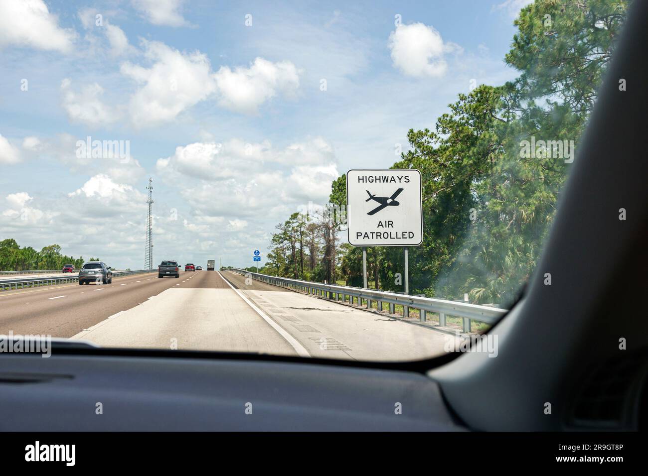 Palm Bay Florida,I-95 Interstate 95 highway,highways air patrolled sign,speeding catching speeders,view through car windshield Stock Photo