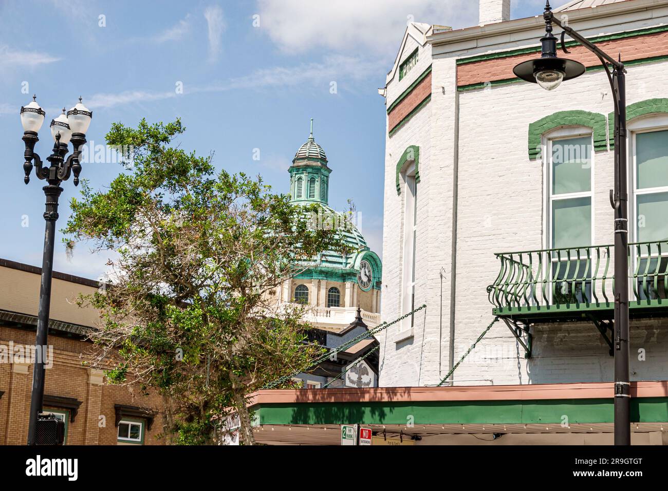 DeLand Florida,small town main street city historic downtown shopping district restored buildings,Volusia County Court House dome Stock Photo