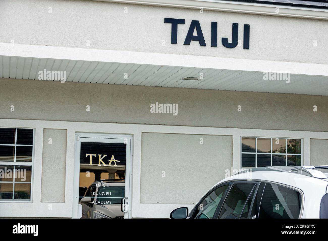 Fleming Island Jacksonville Florida,generic Taiji tai chi sign,martial arts classes,outside exterior,building buildings,front entrance Stock Photo