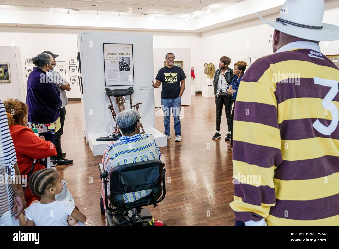 Macon Georgia,Harriet Tubman Museum of African American Art History Culture,Black men women visitors touring,guide speaking,inside interior indoors Stock Photo
