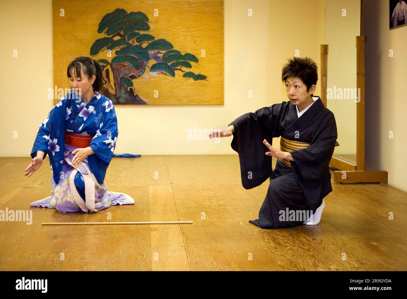 Student learns Japanese folk dance from Teacher Stock Photo - Alamy