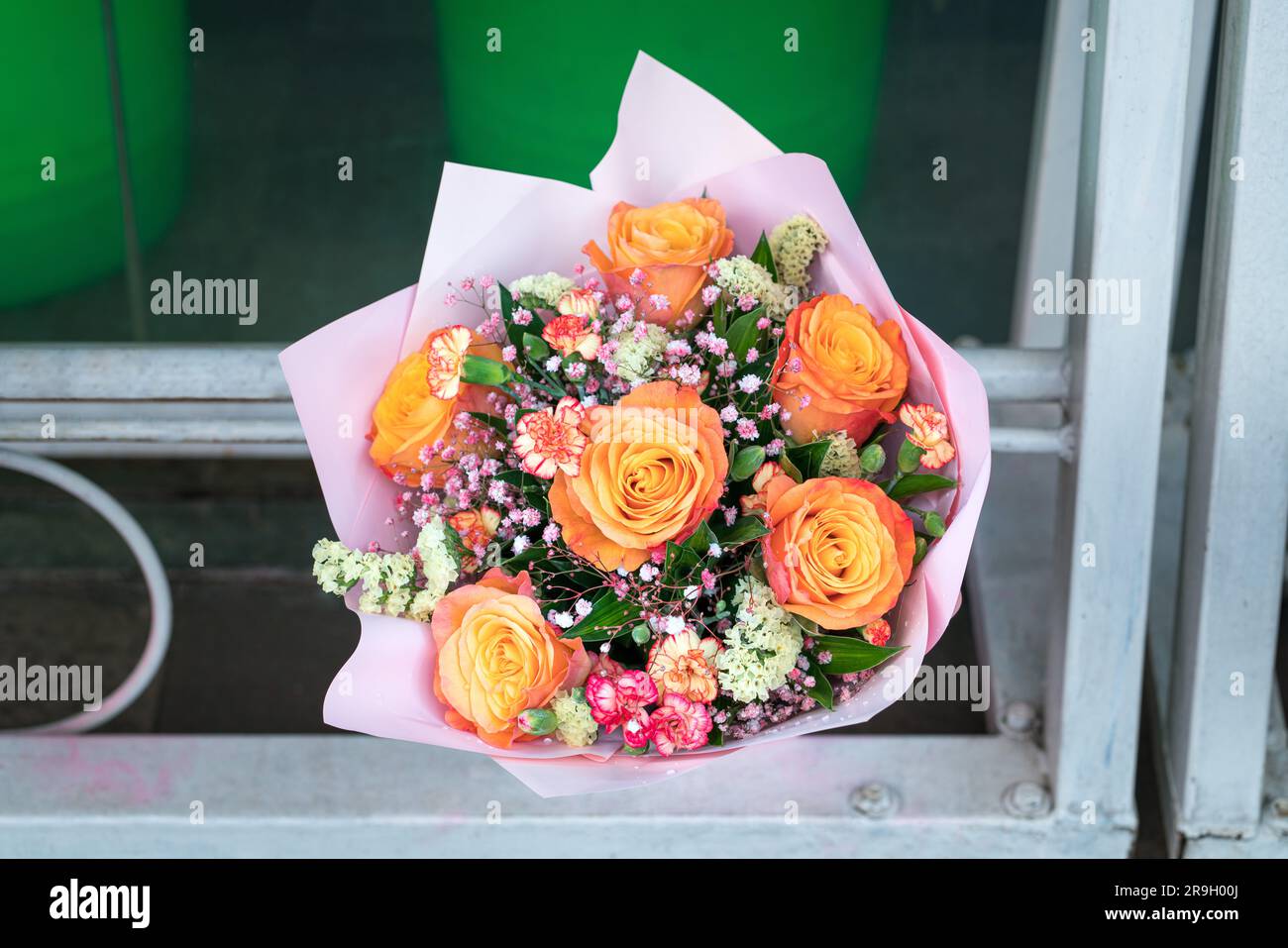Birght vivid yellow roses bouquet in a florist. Stock Photo