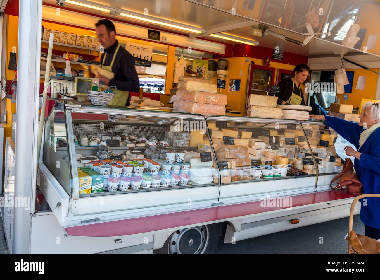 Geneva, Switzerland MAR 25, 2022 Local cheese makers selling their products in a truck at a