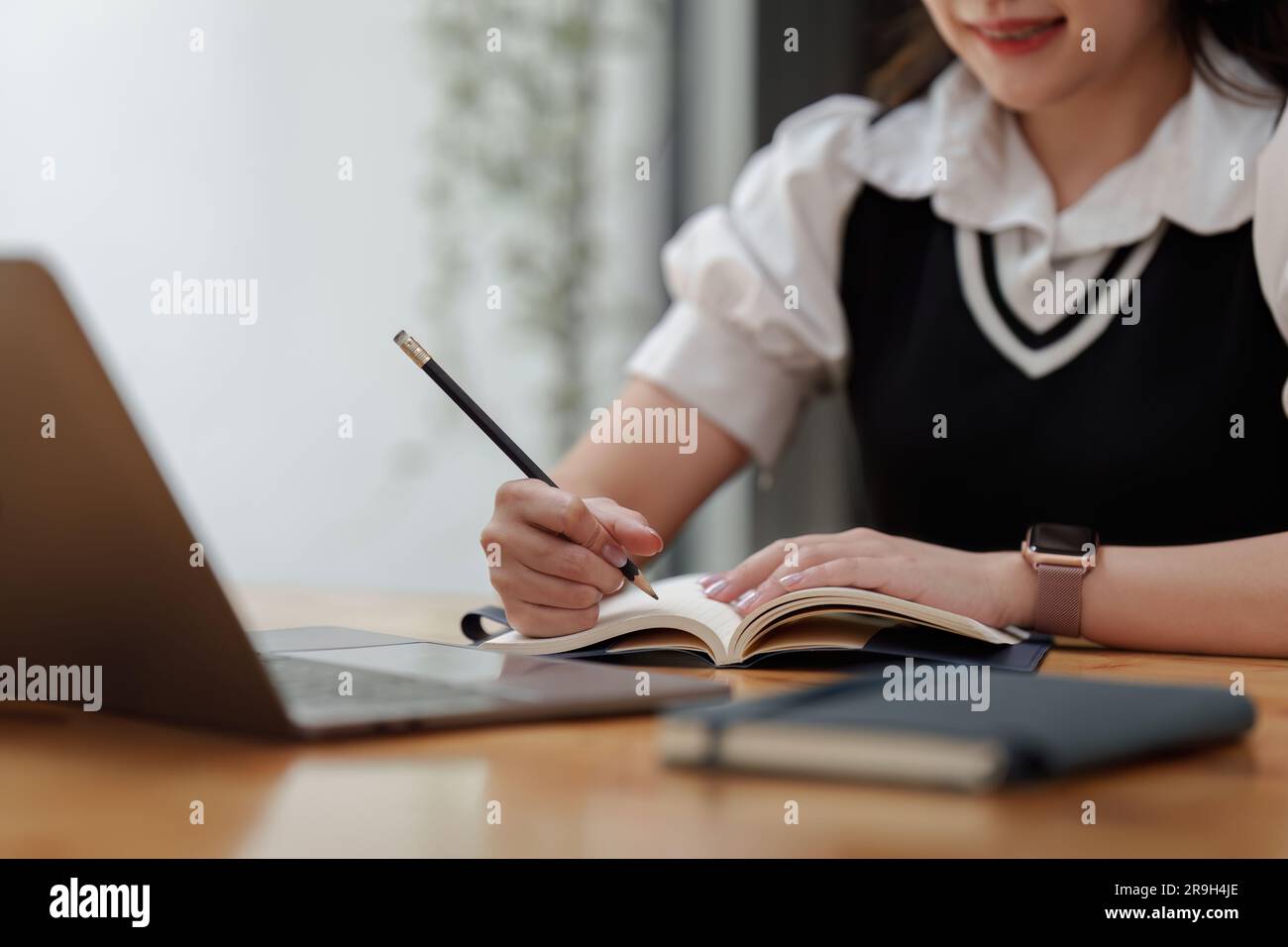 Online education, elearning. Asian woman in stylish casual clothes