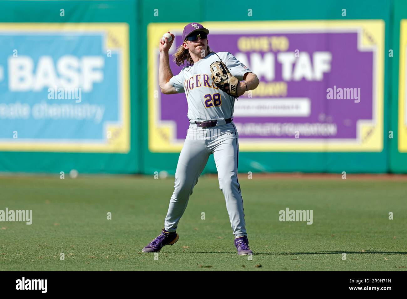 LSU outfielder Paxton Kling (28) warms up before an NCAA college