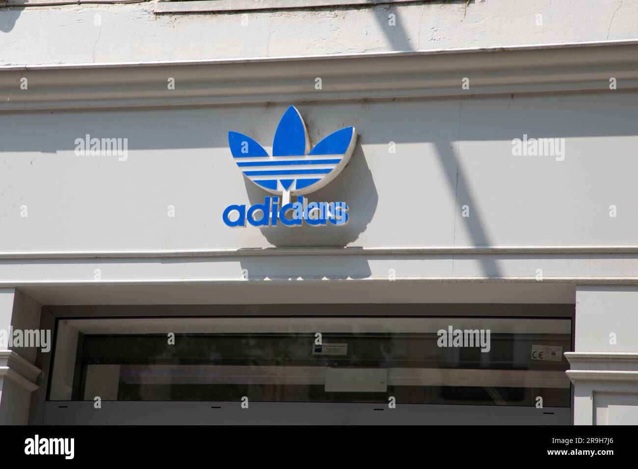 Bordeaux , Aquitaine France - 06 21 2023 : adidas logo sign and text brand  front facade sport shop chain entrance shoes boutique Stock Photo - Alamy