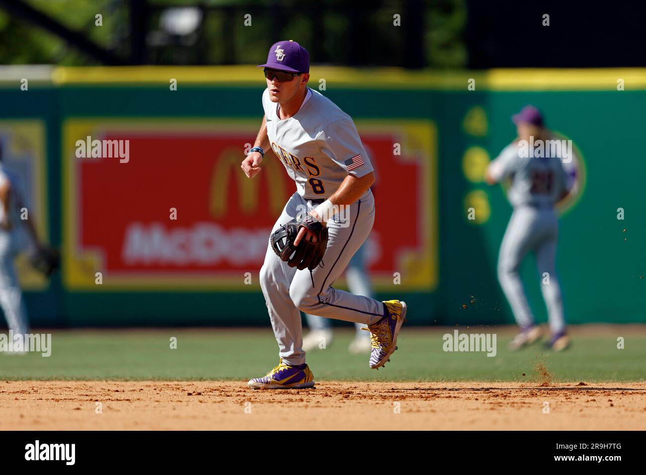 LSU infielder Gavin Dugas (8) warms up before an NCAA college baseball tournament super regional