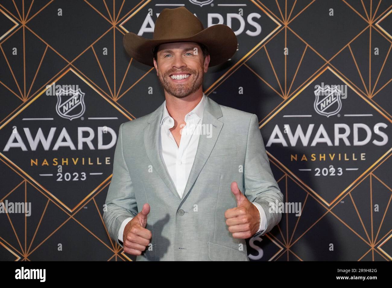 Dustin Lynch poses on the red carpet before the NHL Awards, Monday