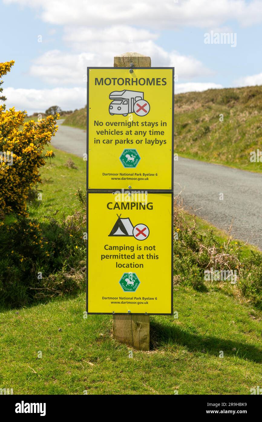 Signs warning of restrictions on camping and overnight stays in motorhomes, Dartmoor, Devon, England, UK Stock Photo
